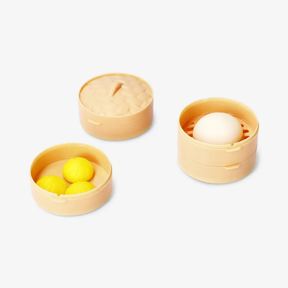 Godis dumplings i korg med ångkokare