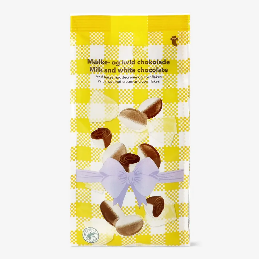 Vita chokladägg med hasselnötskräm och flingor
