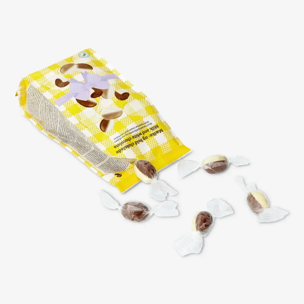 Vita chokladägg med hasselnötskräm och flingor