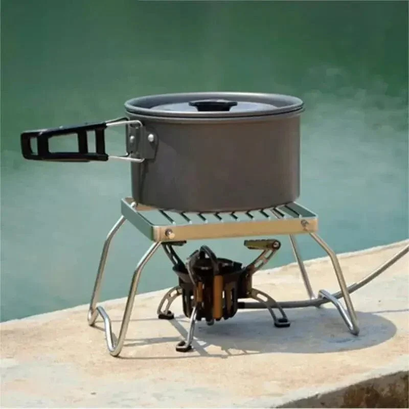 Fällbart ställ för matlagning i rostfritt stål för campinggrill.