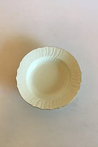 Royal Copenhagen Creme Svejfet med Guld (Stel 1235) Dyb Desserttallerken No. 1616