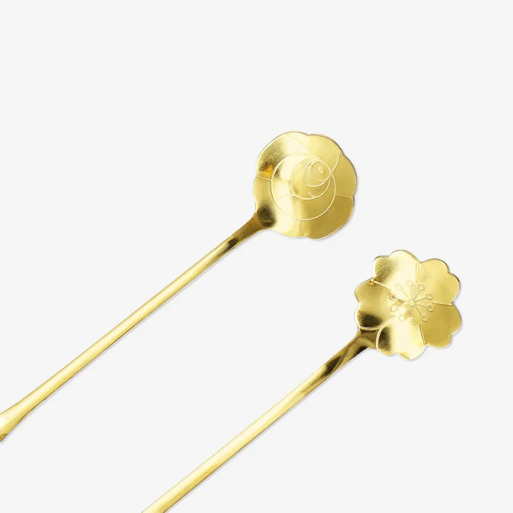 Skedar med blommönster i guld - 2 st