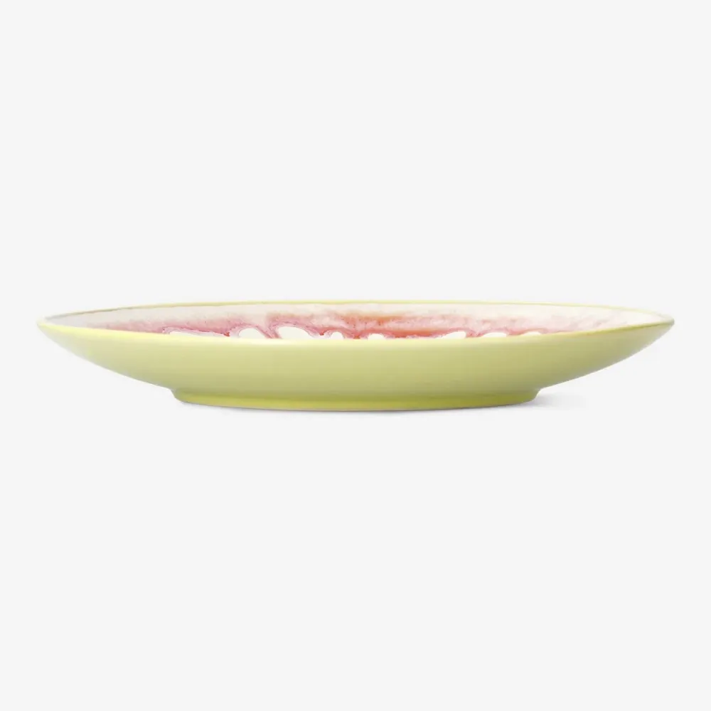Tallrik med droppande glasyr