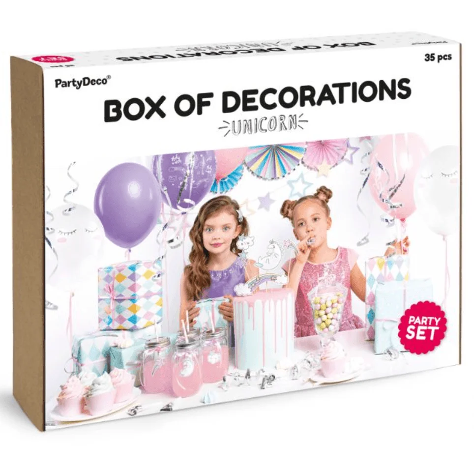 Box med dekorationer med enhörningstema